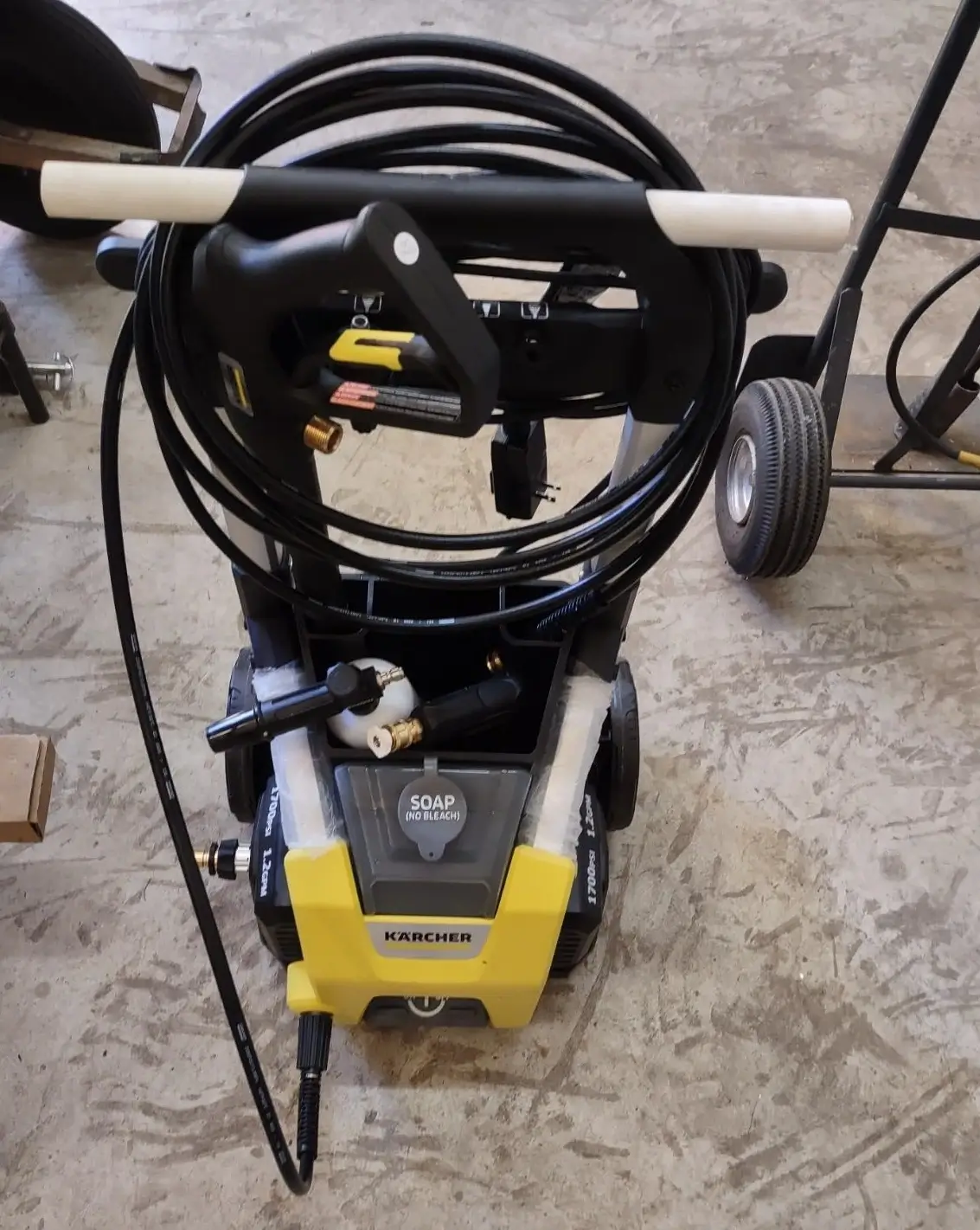 Karcher K1700 Review: Real-World Test & Performance Limits 4 Karcher K1700 upright storage footprint setup in a garage